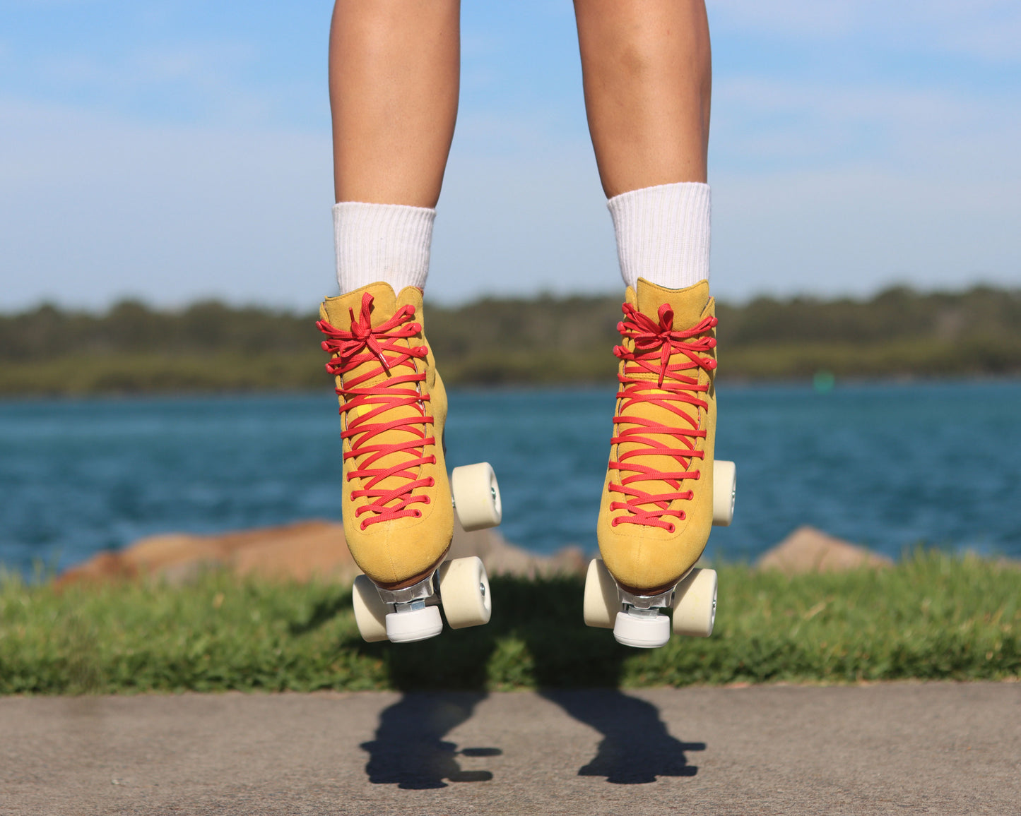 Chuffed Skates yellow roller skates jumping